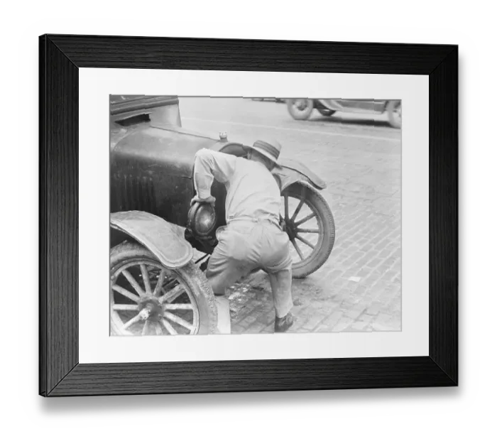 Framed Print : Man Cranking Car Framed Print : Man Cranking Car