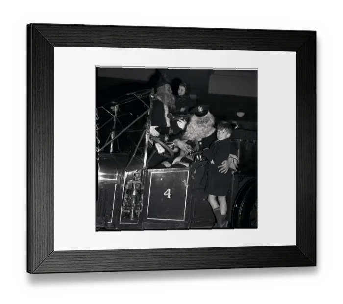 Framed Print : Children Seated with Santa on a Truck Framed Print : Children Seated with Santa on a Truck