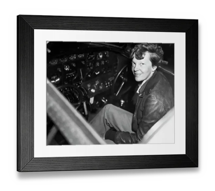 Framed Print : Amelia Earhart in the Cockpit of an Airplane Framed Print : Amelia Earhart in the Cockpit of an Airplane