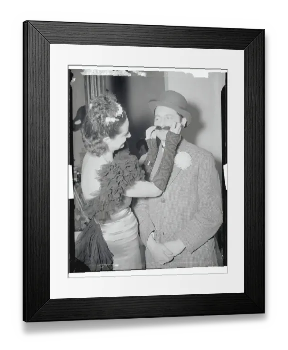 Framed Print : Woman Fixing Her Husband's Mustache Framed Print : Woman Fixing Her Husband's Mustache