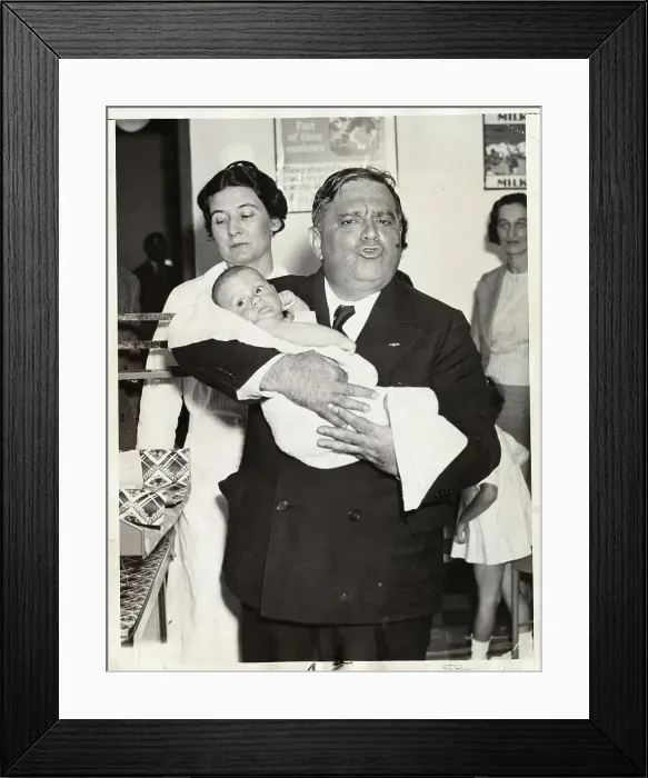 Framed Print : Mayor Fiorello LaGuardia Holding Baby Framed Print : Mayor Fiorello LaGuardia Holding Baby