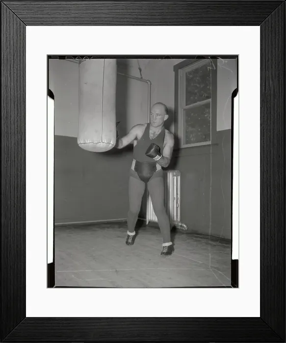 Framed Print : Marcel Thil Hitting Punching Bag Framed Print : Marcel Thil Hitting Punching Bag