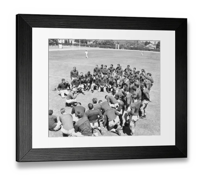 Framed Print : Coach Giving Pep Talk to Players