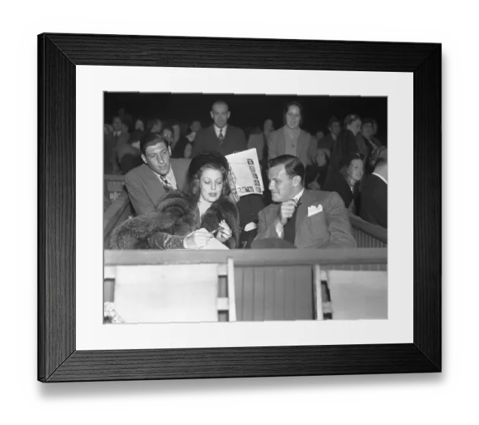 Framed Print : Joe Mankewicz and Loretta Young Sitting with Crowd Behind Framed Print : Joe Mankewicz and Loretta Young Sitting with Crowd Behind