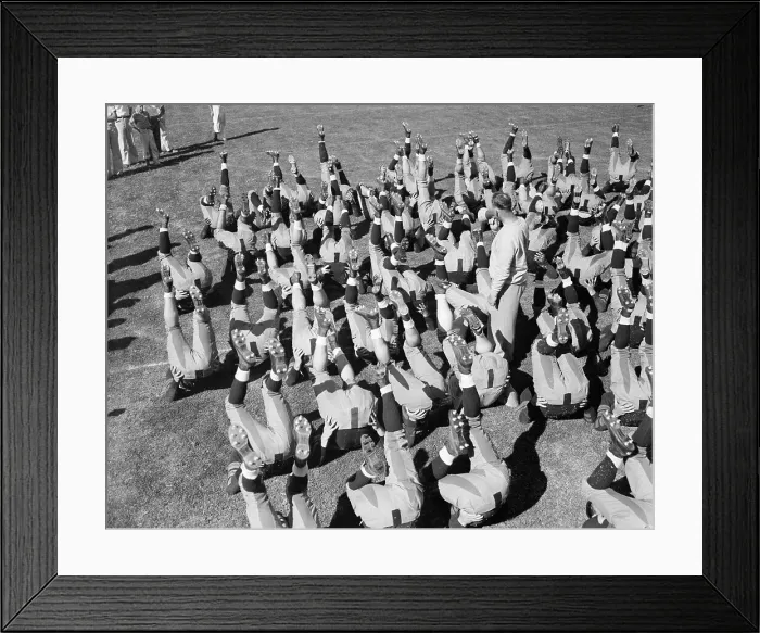 Framed Print : College Football Team Exercising Framed Print : College Football Team Exercising