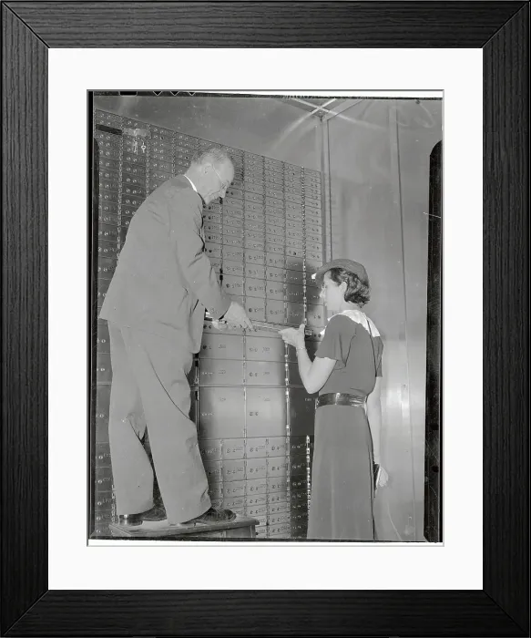 Framed Print : Former White House Guard Working in Safe Deposit Vault