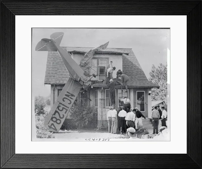 Framed Print : Student Airplane Crashes into House Framed Print : Student Airplane Crashes into House