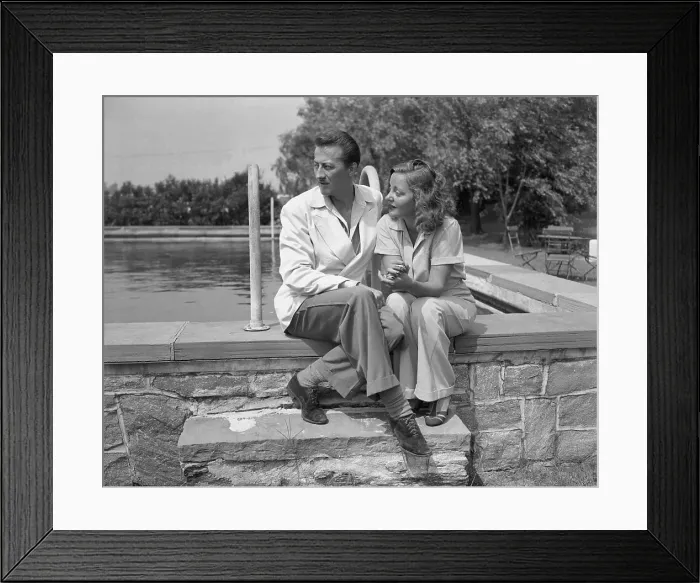 Framed Print : John Emery and Talullah Bankhead Sitting by Pool Framed Print : John Emery and Talullah Bankhead Sitting by Pool