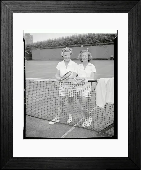 Framed Print : Competing Women Tennis Players Standing by Net