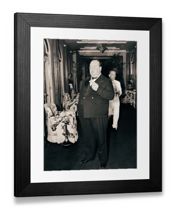 Framed Print : Alfred Hitchcock Smokes in Hallway Framed Print : Alfred Hitchcock Smokes in Hallway