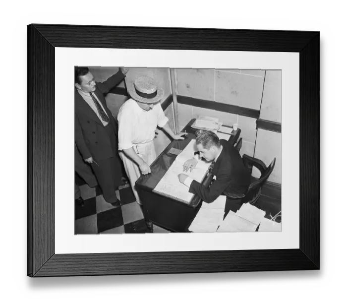 Framed Print : Bank Employee Checks Depositor's Account Framed Print : Bank Employee Checks Depositor's Account
