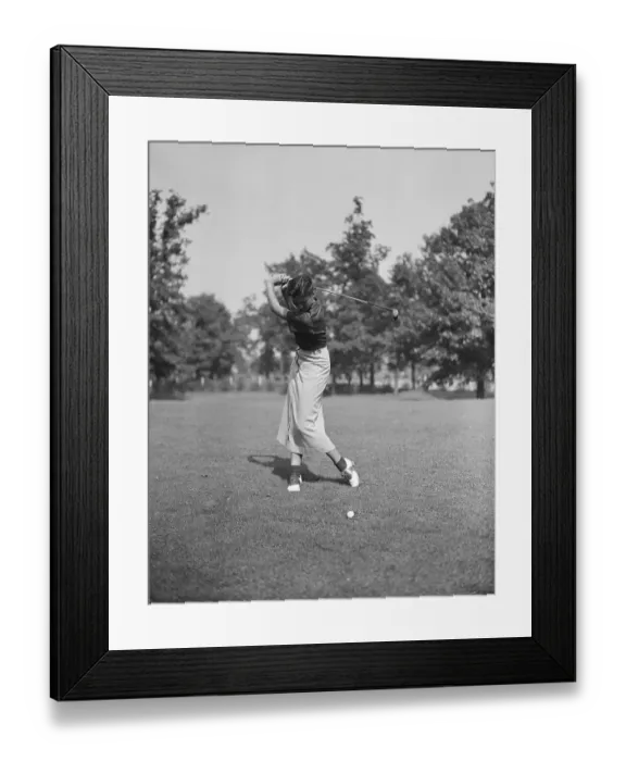 Framed Print : Woman Golfer In Mid-Swing Framed Print : Woman Golfer In Mid-Swing