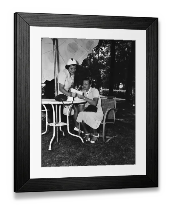 Framed Print : Babe Didrikson and Helen Hicks Compare Scores Framed Print : Babe Didrikson and Helen Hicks Compare Scores