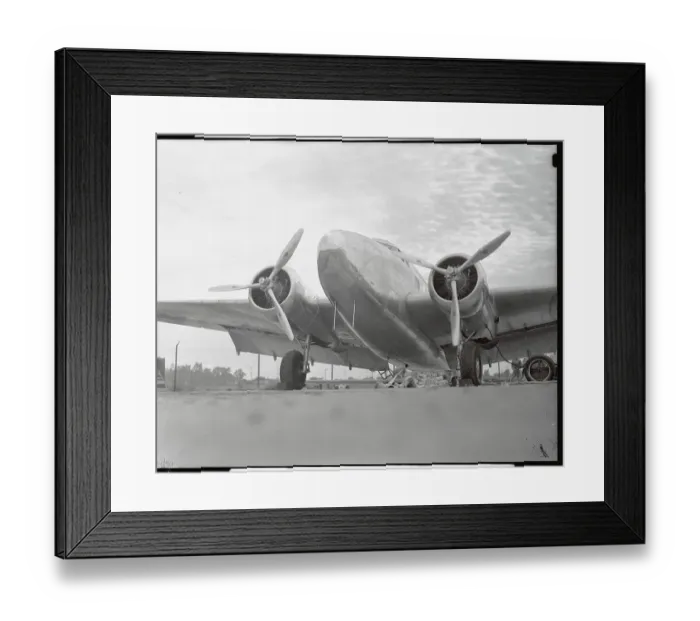 Framed Print : Airplane on Runway