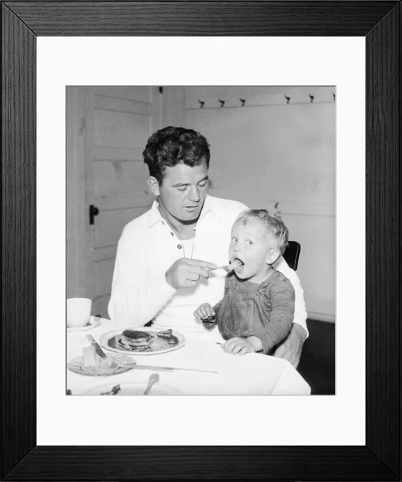 Framed Print : James Braddock Feeding Child Framed Print : James Braddock Feeding Child