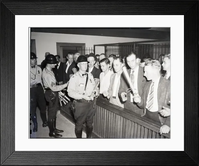 Framed Print : Police Giving Clubs to Vigilantes Framed Print : Police Giving Clubs to Vigilantes