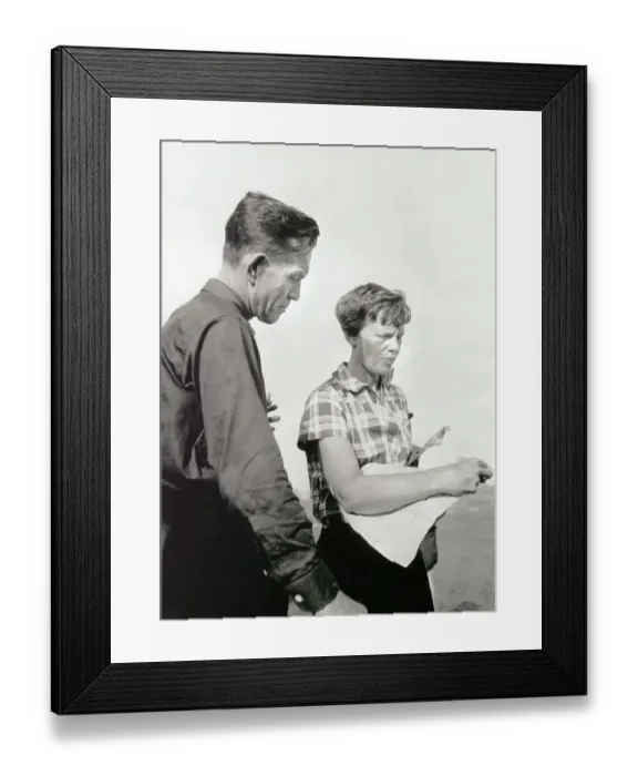 Framed Print : Amelia Earhart Putnam and Fred Noonan Looking over Map Framed Print : Amelia Earhart Putnam and Fred Noonan Looking over Map