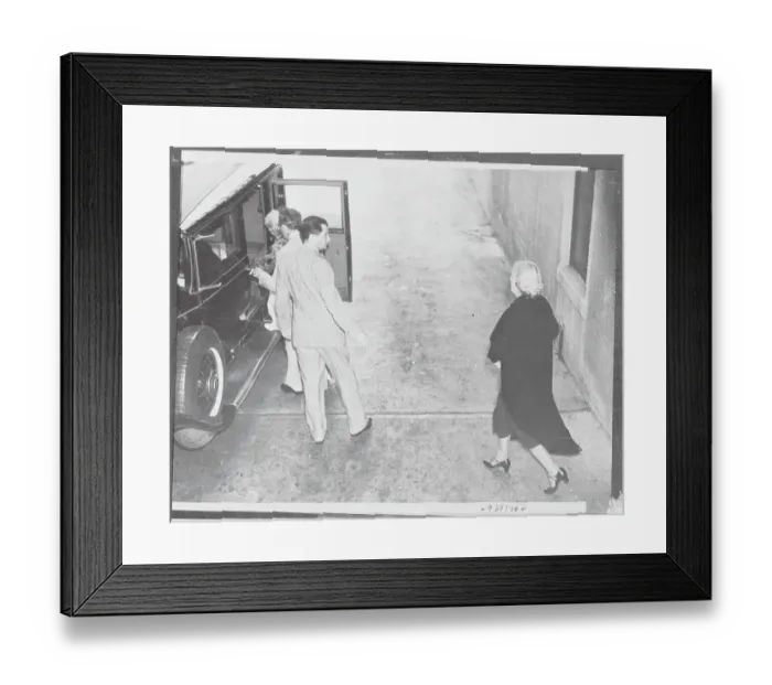 Framed Print : Jean Bello Entering Car Assisted by Ex-Husband Framed Print : Jean Bello Entering Car Assisted by Ex-Husband