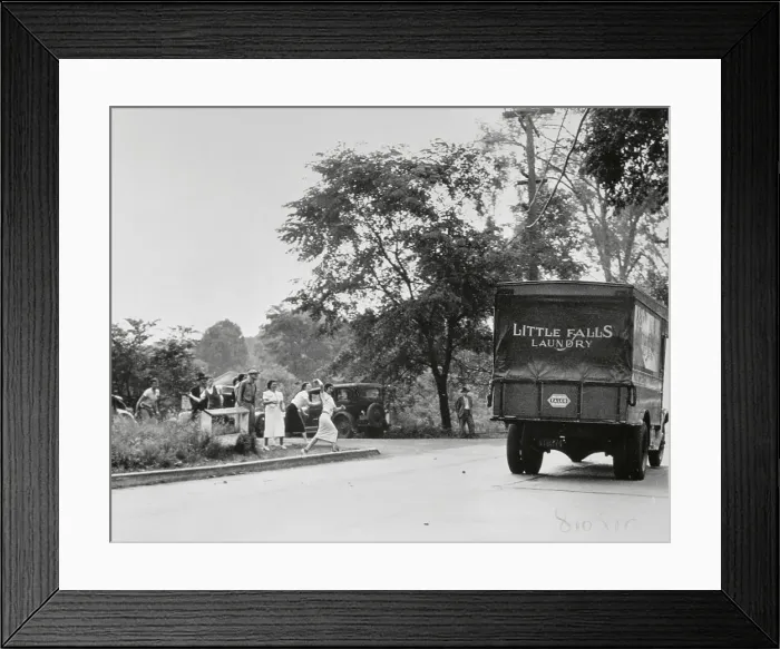 Framed Print : Women Throwing Rocks At Laundry Truck Framed Print : Women Throwing Rocks At Laundry Truck