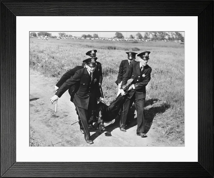 Framed Print : Police Carrying Wounded Steel Striker Framed Print : Police Carrying Wounded Steel Striker