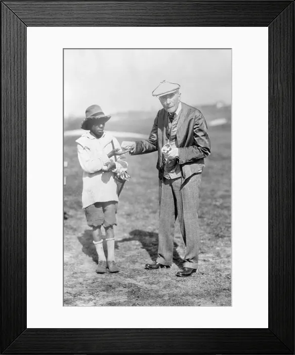 Framed Print : John D. Rockefeller with His Caddy Framed Print : John D. Rockefeller with His Caddy