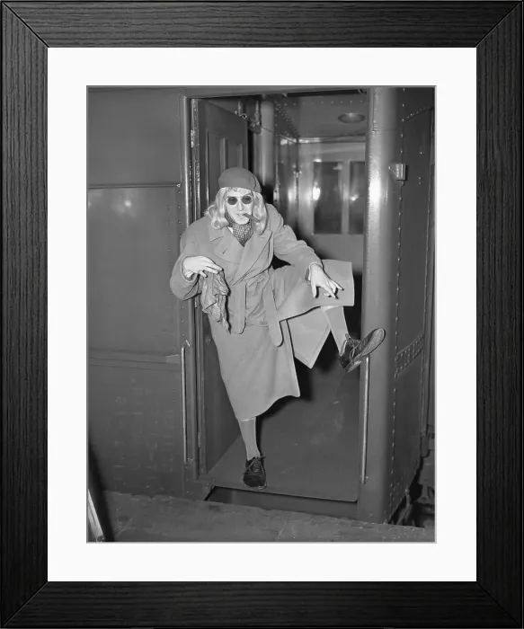 Framed Print : Milton Berle Wearing Wig and Pointing to Shoe Framed Print : Milton Berle Wearing Wig and Pointing to Shoe
