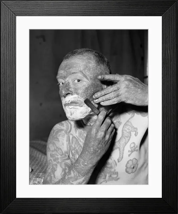 Framed Print : Tattooed Man Shaving Framed Print : Tattooed Man Shaving