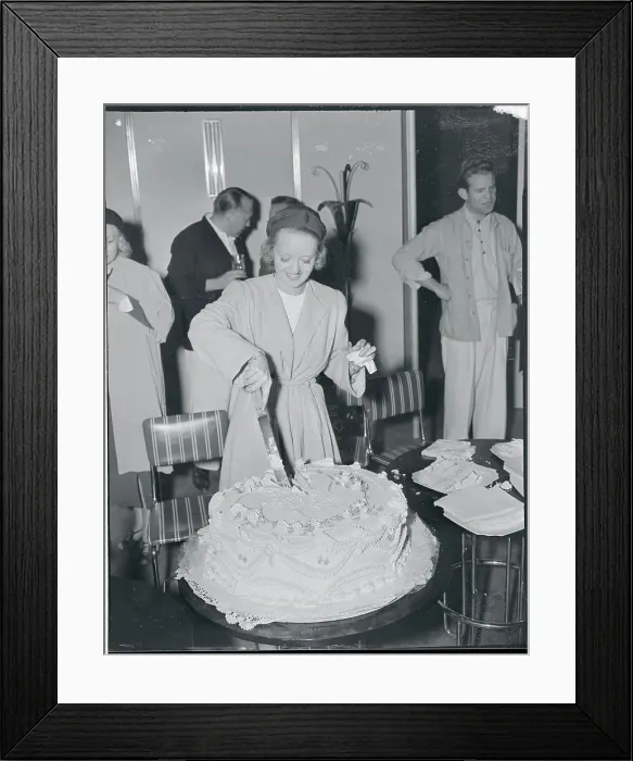 Framed Print : Actress Bette Davis Cutting Large Cake Framed Print : Actress Bette Davis Cutting Large Cake