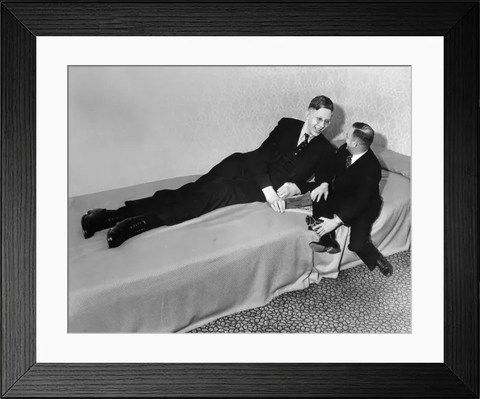 Framed Print : Giant Robert Wadlow Talking with a Friend on a Bed Framed Print : Giant Robert Wadlow Talking with a Friend on a Bed