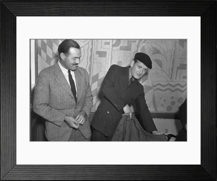 Framed Print : Ernest Hemingway Conversing with Sidney Sullivan Framed Print : Ernest Hemingway Conversing with Sidney Sullivan