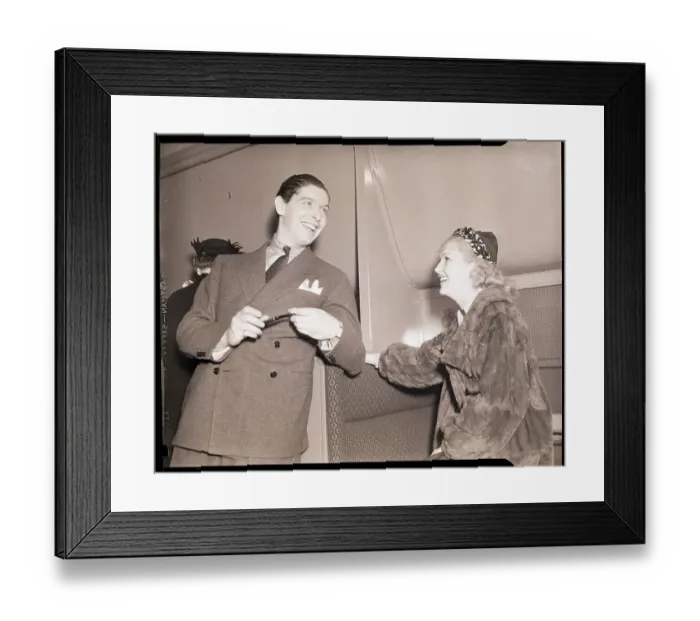Framed Print : Milton Berle Greeted by Betty Grable Framed Print : Milton Berle Greeted by Betty Grable