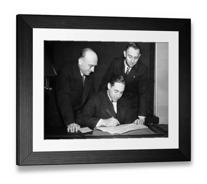 Framed Print : Bob Feller Signs Contract;Men Look On Framed Print : Bob Feller Signs Contract;Men Look On