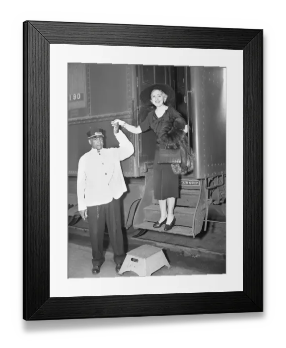 Framed Print : Man Helps Helen Jepson Down from Train Framed Print : Man Helps Helen Jepson Down from Train