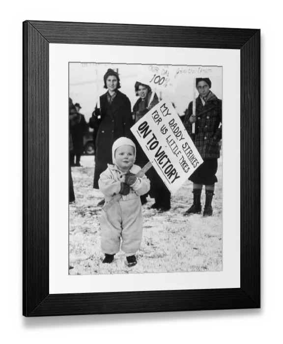Framed Print : Baby Carries A Strike Banner Framed Print : Baby Carries A Strike Banner