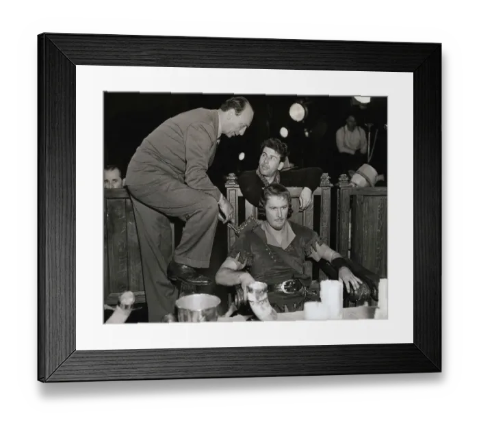 Framed Print : Director Preparing Actor Errol Flynn for Movie Scene Framed Print : Director Preparing Actor Errol Flynn for Movie Scene