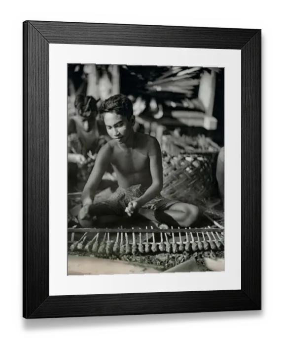 Framed Print : Balinese Man Roasting Turtle Framed Print : Balinese Man Roasting Turtle