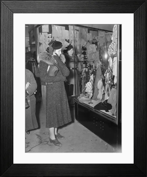 Framed Print : Sales Clerk in Coat Window Shops