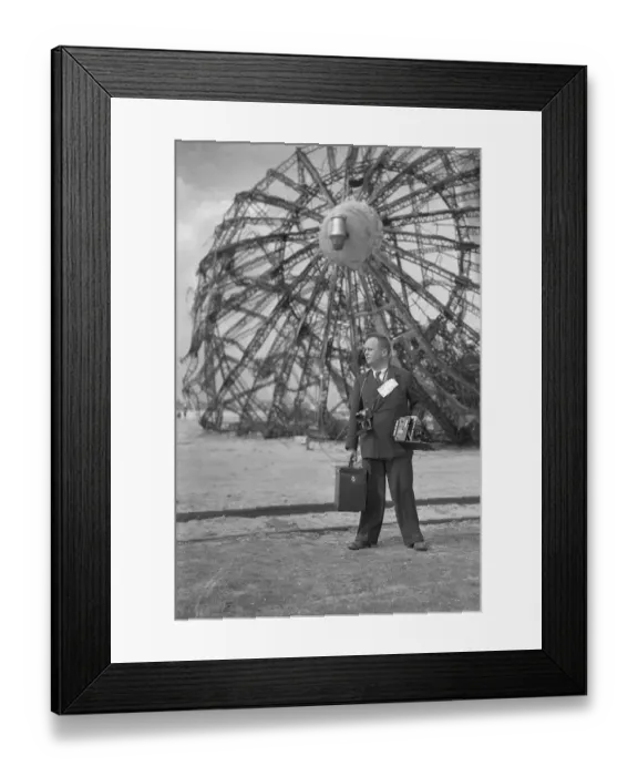 Framed Print : Sam Shere, photographer, in front of Hindenburg wreckage Framed Print : Sam Shere, photographer, in front of Hindenburg wreckage