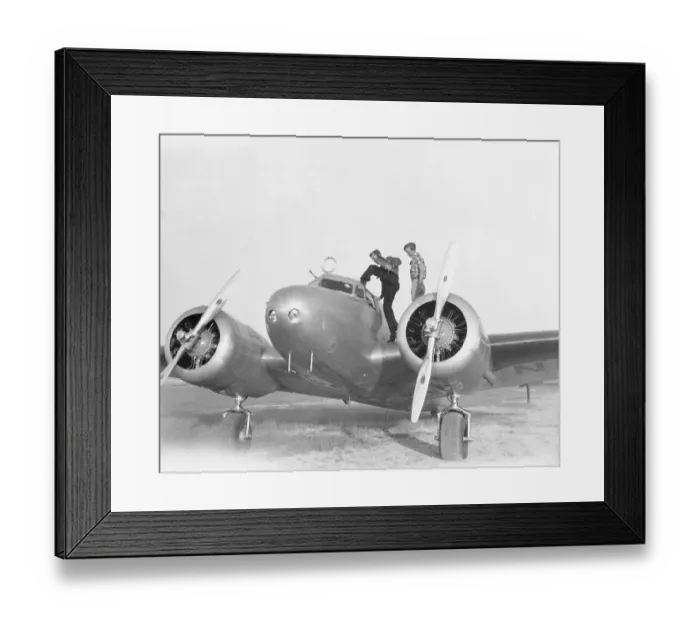 Framed Print : Amelia Earhart and Fred Noonan Entering Plane Framed Print : Amelia Earhart and Fred Noonan Entering Plane