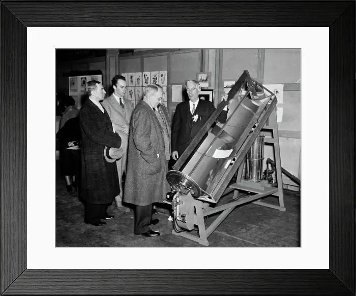 Framed Print : Scientist Demonstrates Solar Energy Machine Framed Print : Scientist Demonstrates Solar Energy Machine