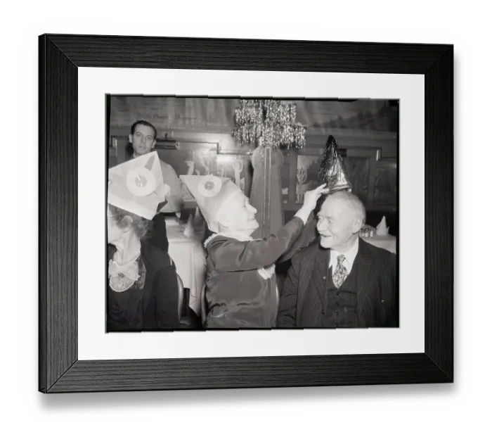 Framed Print : Woman Puts Hat On Man In Banquet Hall Framed Print : Woman Puts Hat On Man In Banquet Hall