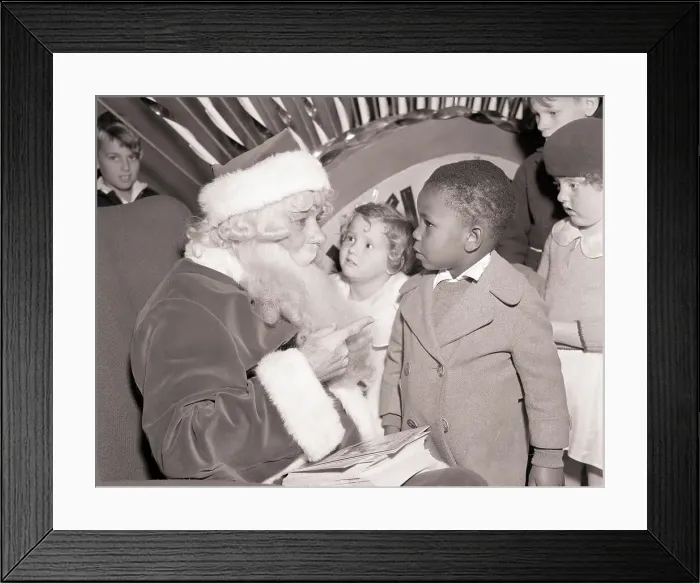 Framed Print : Little Boy Visiting Santa Framed Print : Little Boy Visiting Santa