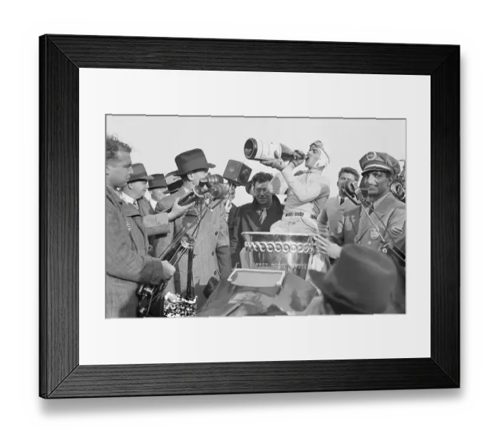 Framed Print : Tazio Nuvolari Drinking Champagne After Winning Race Framed Print : Tazio Nuvolari Drinking Champagne After Winning Race