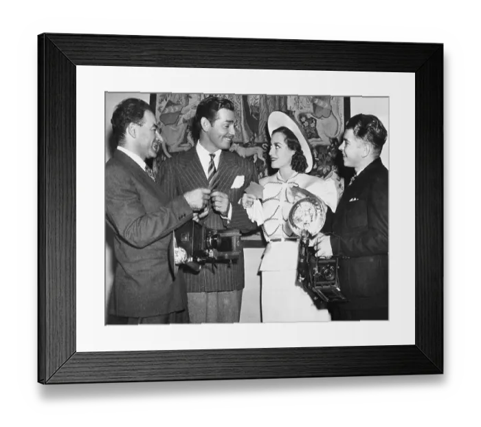 Framed Print : Clark Gable and Joan Crawford With Photographers Framed Print : Clark Gable and Joan Crawford With Photographers