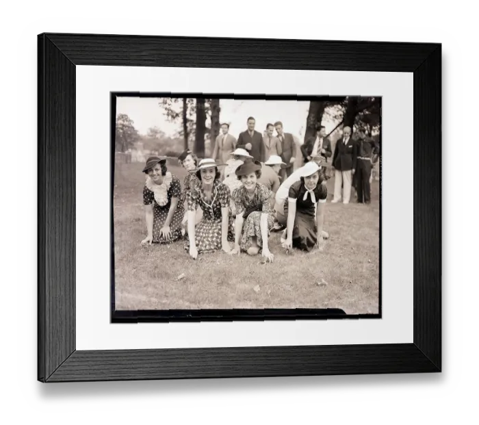Framed Print : Women Releasing Frogs for Jumping Contest Framed Print : Women Releasing Frogs for Jumping Contest