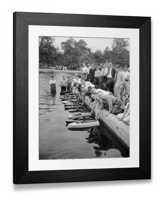 Framed Print : USA, New York City, Manhattan, Central Park, Model speedboat racers lined up for race Framed Print : USA, New York City, Manhattan, Central Park, Model speedboat racers lined up for race