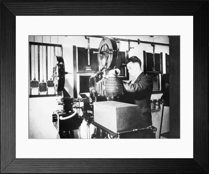 Framed Print : Film Projector and Technician Framed Print : Film Projector and Technician
