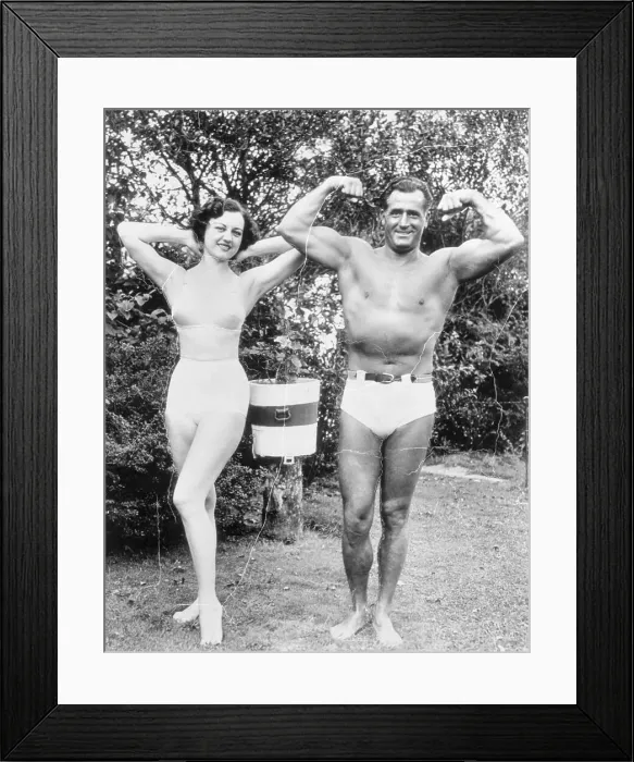 Framed Print : Actress Dorothy Wilson Posing with Charles Atlas Framed Print : Actress Dorothy Wilson Posing with Charles Atlas