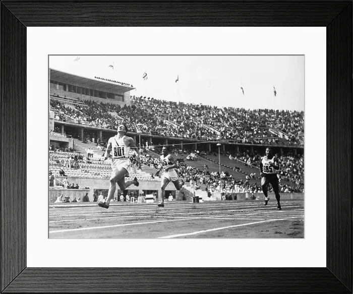 Framed Print : Glenn Morris Wins Decathlon Dash