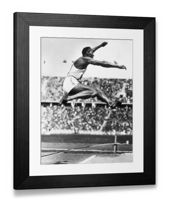 Framed Print : Jesse Owens in Midair Framed Print : Jesse Owens in Midair